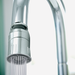 Chrome Dual-Spray Swivel Aerator attached to faucet