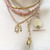 three sisters jewelry design Gold Phoenix Rising Sun Charm