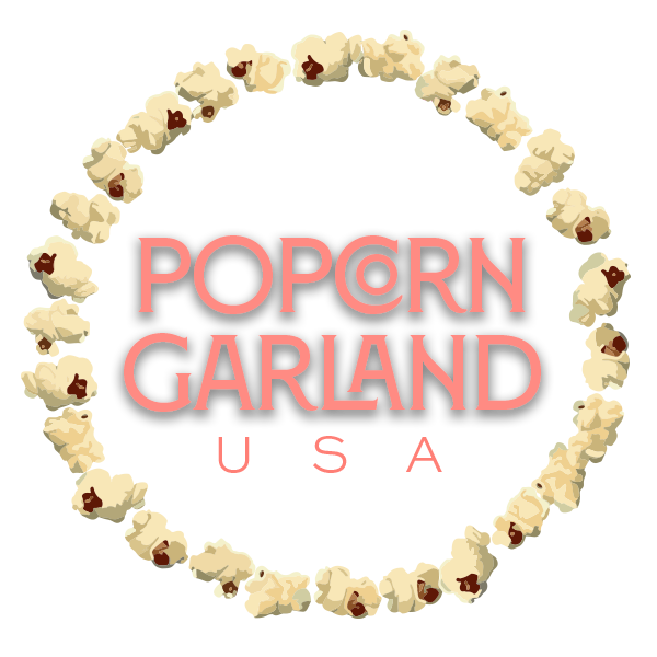 Popcorn Garland USA surrounded by a circle of fluffy popcorn kernels