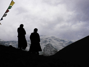 Silhouetted Women on Tibetan Plateau