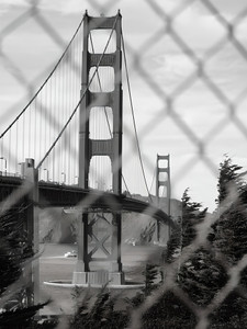Golden Gate Bridge Via Fence B&W