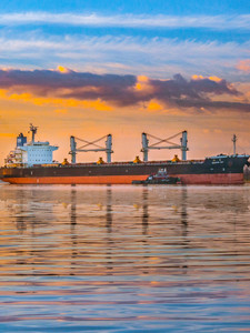 Cargo Ship at Sunrise