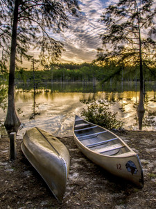Canoes by the Lakeside at Dawn