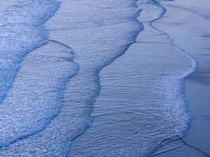 Horizontal Blue Ocean Waves Rolling Into Shore