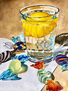 Lemon in Glass of water  with glass candies
