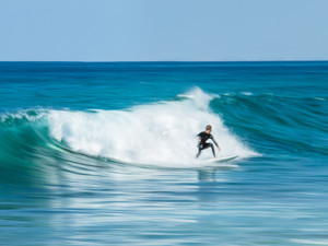 Blue Water Surfer