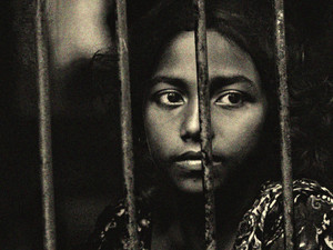 IN THE CAGE OF THE FREEDOM vs. BEHIND PRISON OF THE OPRESSION
