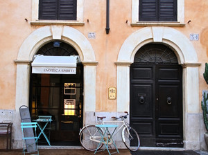 Bicycle with Blue Table and Chairs in Roma