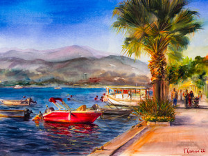 Fethiye, Turkey, city embankment. Red boat and palm trees.