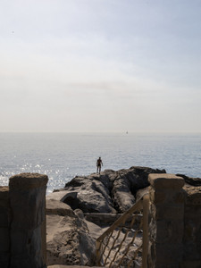 Italy Sunrise Beach - Man Gazing at Dawn