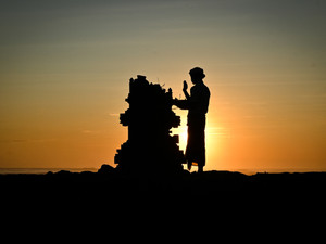 Balinese man praying