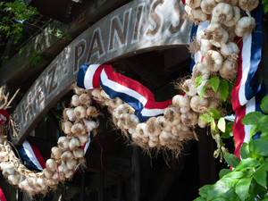Entrance to Chez Panisse festooned with garlic