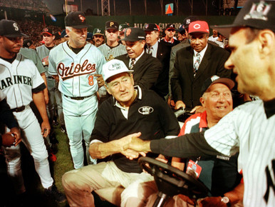 Ted Williams is surrounded by All Stars during an appearance at