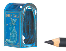 A miniature book nook kit with a spooky woods interior.
