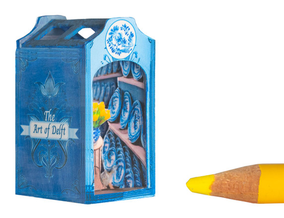 Visit a tiny Delft porcelain shop in a miniature book nook.