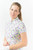 Pure Golf Rise Cap Sleeve Polo Shirt - Ethereal Bouquet
