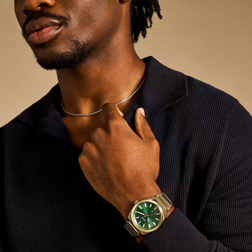 Men's Fossil Everett Gold Tone Stainless Steel Watch - Green Dial Model Wearing The Watch