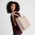 Model holding Baby Bogg Bag Small Tote