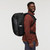 Cotopaxi Allpa 42L Travel Pack Cotopaxi Black Model Side