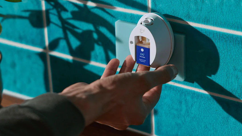 Pura Smart Home Diffuser With Capri Blue Vial.