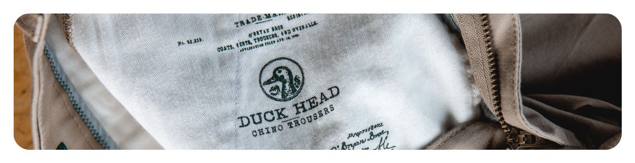 Duck Head Chino Trousers print on inside of pants featuring trademark and logo