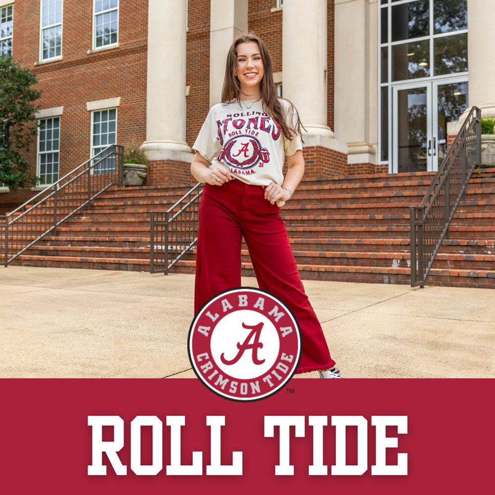 Man wearing Univeristy of Alabama white and red striped polo.