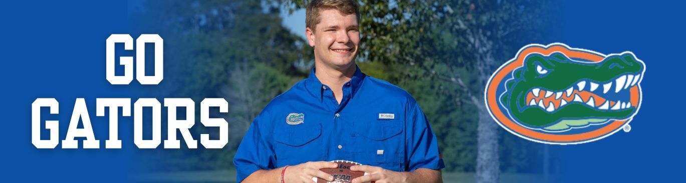 The University of Florida Collegiate Apparel. Man throwing football wearing a blue University of Florida short sleeve button down shirt.