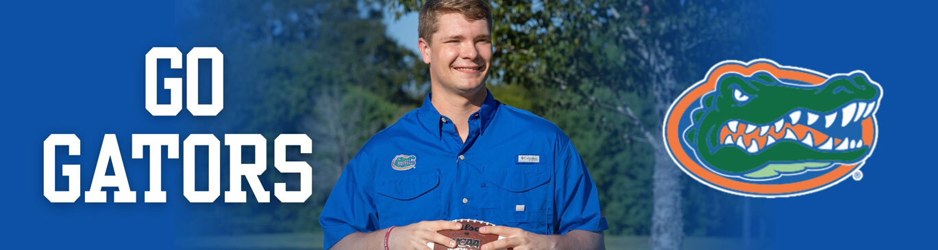The University of Florida Collegiate Apparel. Man throwing football wearing a blue University of Florida short sleeve button down shirt.