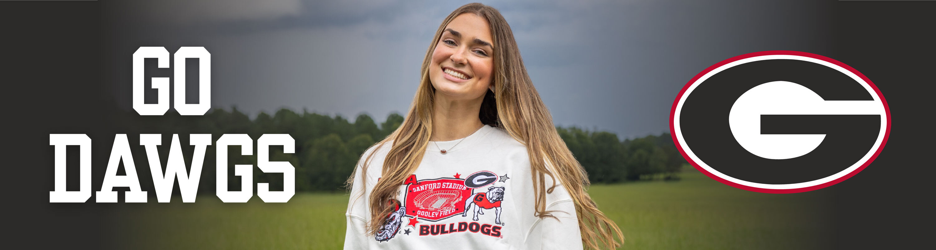 The University of Georgia Southern Collegiate Apparel. Girl wearing Georgia Bulldogs sweatshirt.