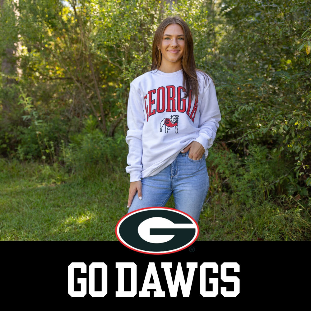 The University of Georgia Southern Collegiate Apparel. Girl cheering wearing grey Georgia Bulldogs t-shirt.