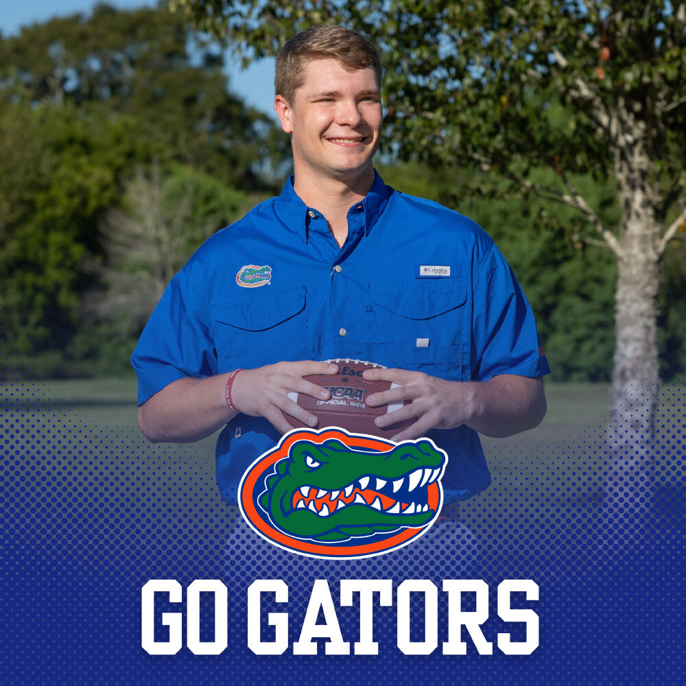 The University of Florida Collegiate Apparel. Man throwing football wearing a blue Florida Gators short sleeve button down shirt.