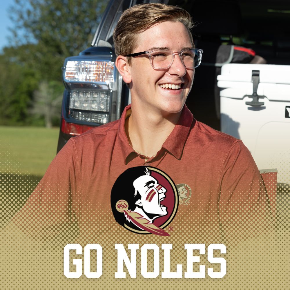 Florida State University Southern Collegiate Apparel. Two male students holding Yeti cooler tailgating wearing Florida State University red shirts.