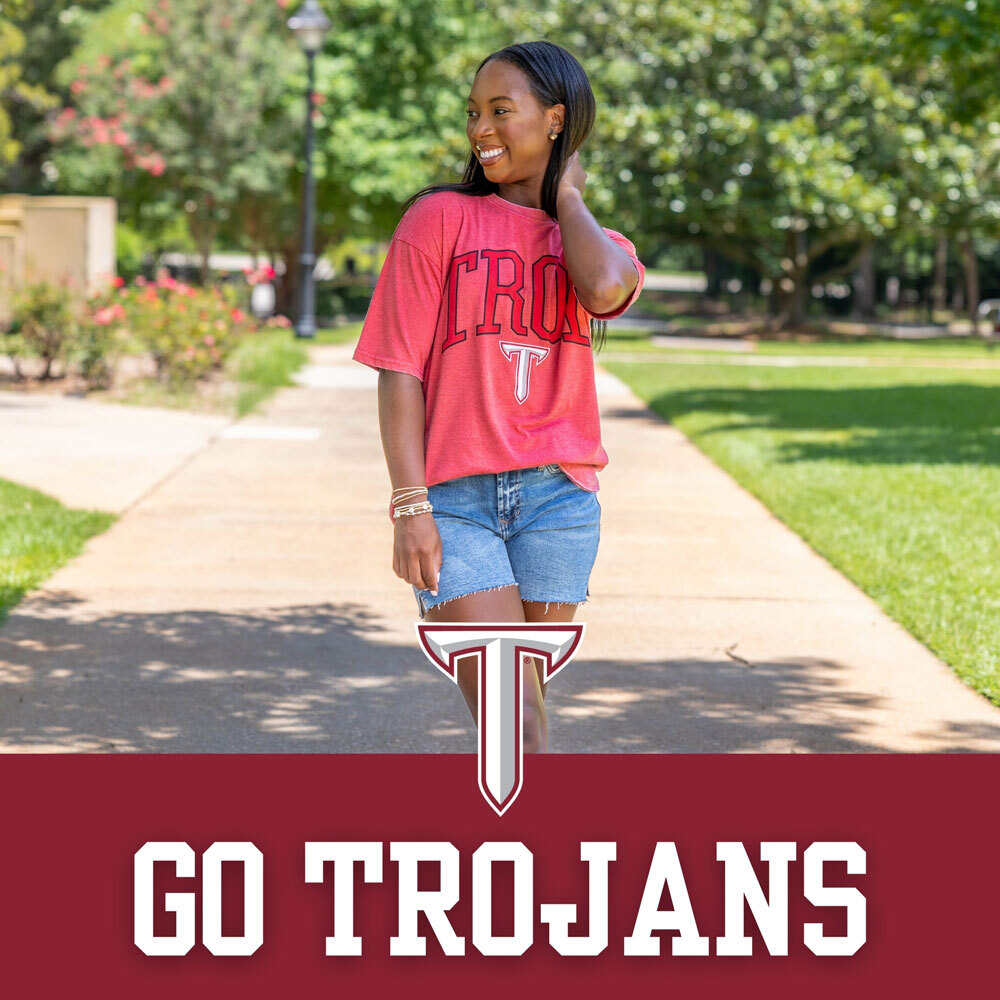 Troy University  Southern Collegiate Apparel. Group of students cheering wearing Troy University t-shirts, polos and shirts.