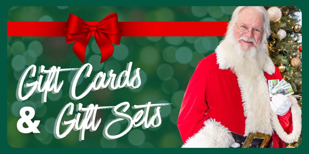 Gift Cards & Gift Sets. Image features Santa Claus holding Eagle Eye Outfitters Gift Cards