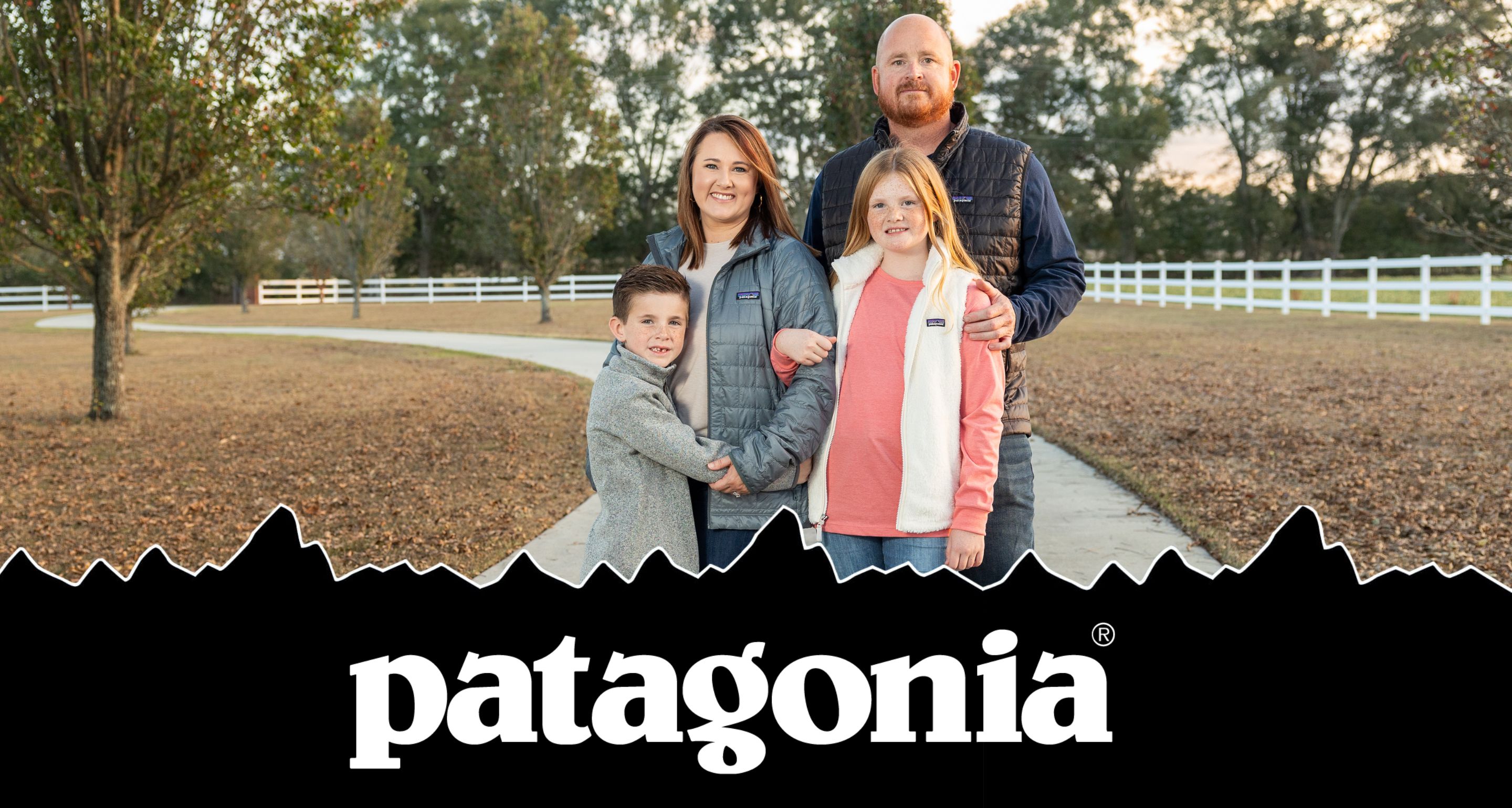 A family of four wearing Patagonia outerwear in a fall setting.
