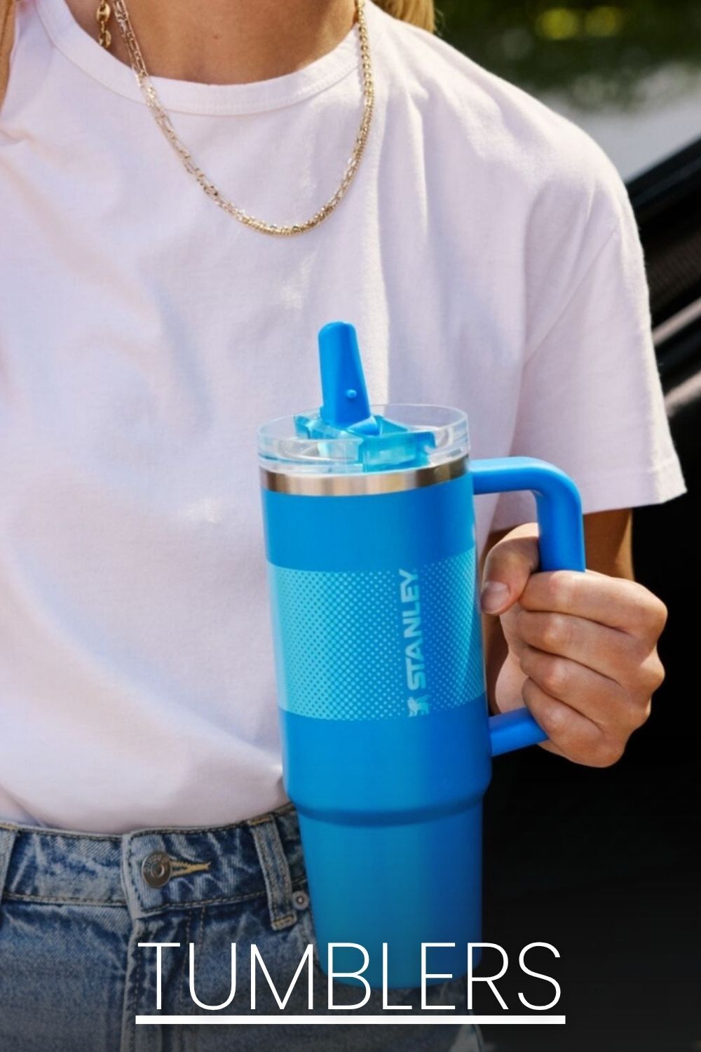 Link to Tumblers with woman holding a Stanley straw mug
