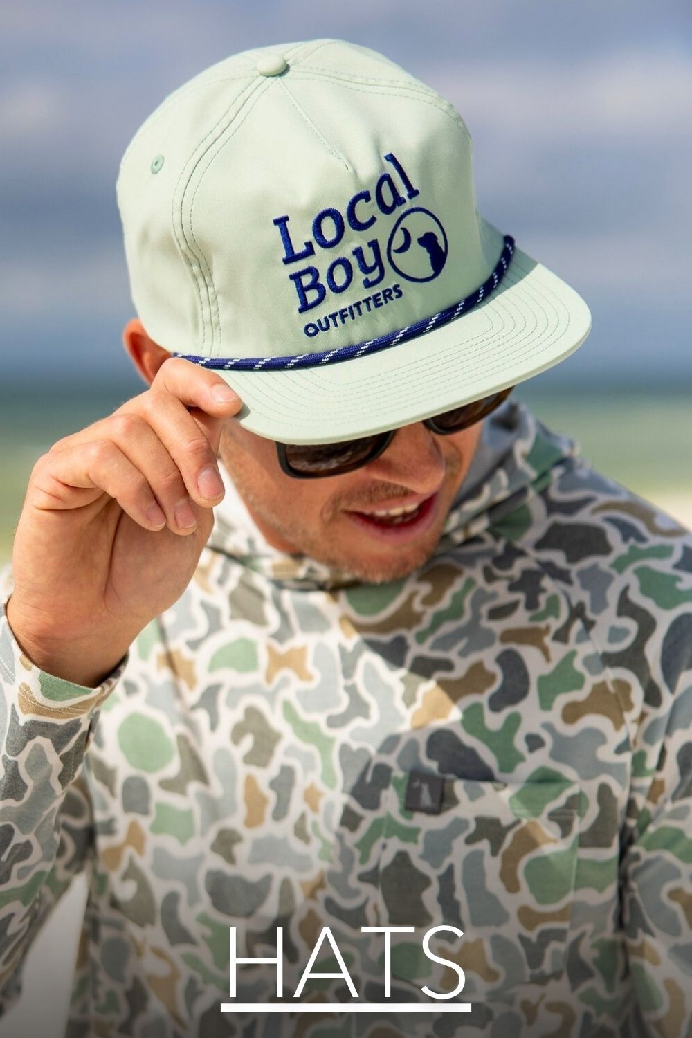 Link to Hats with man wearing Local Boy hat