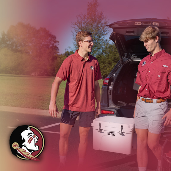 Florida State University Southern Collegiate Apparel. Two male students holding Yeti cooler tailgating wearing Florida State University red shirts.