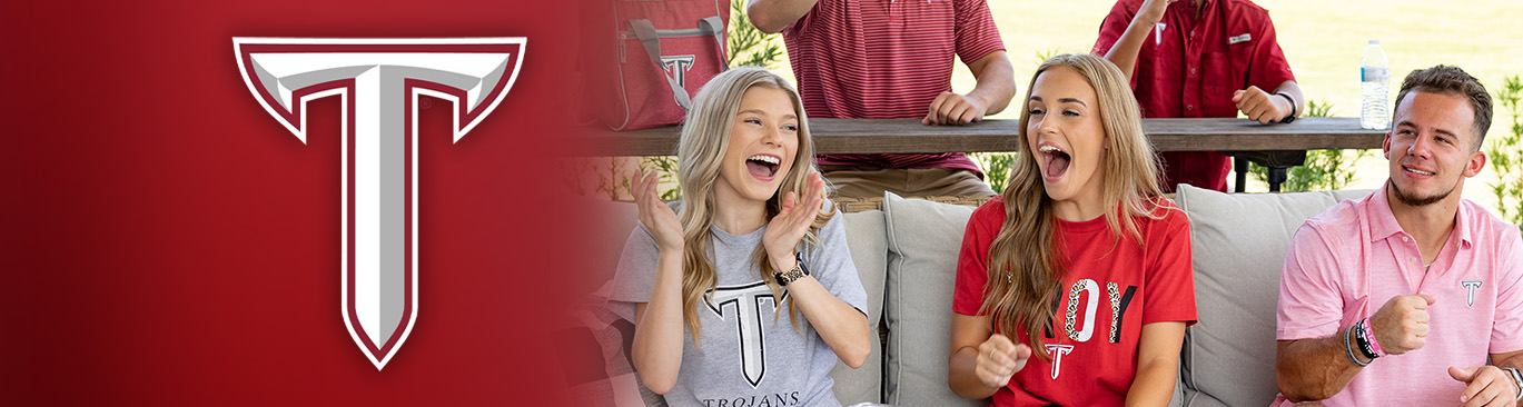 Troy University  Southern Collegiate Apparel. Group of students cheering wearing Troy University t-shirts, polos and shirts.