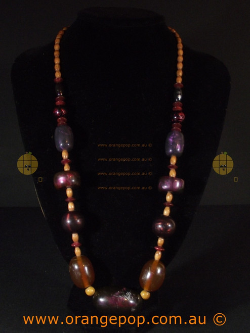 Large beaded women's necklace, purples and earthy tones