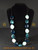 Long beaded detailed necklace blues