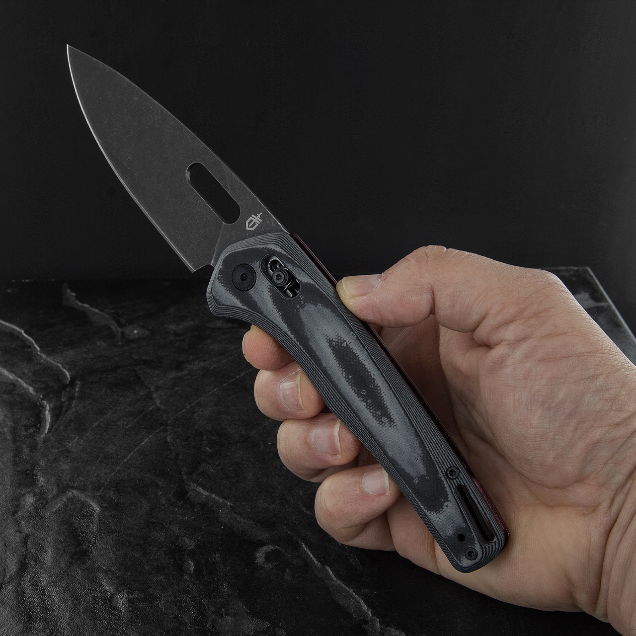 Gerber Sumo Pivot Lock Folding Knife 3.875 7Cr17M0V Stonewashed Plain  Blade, Black and White Layered G10 Handles - KnifeCenter - 31-001815