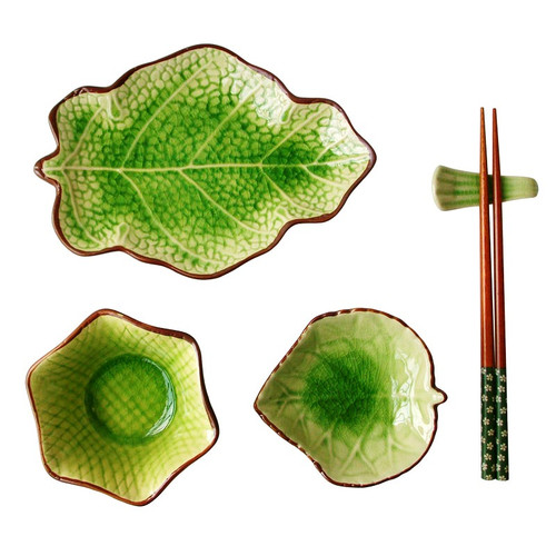 Ceramic green calvings glaze sushi tableware for one person, including leaf shape sushi plate, tapas bowls, wood chopstiks and rest.