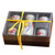 Ceramic sake set in black box with yellow ribbon, elegant wine gifts for friends who love Asian culture.