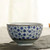 Vintage 4.5 inch japanese porcelain rice bowl, blue-and-white hand painted plum blossom design.