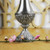 Metal flower vase with gorgeous filigree carvings on its base