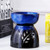 Unique ceramic oil burner in dark blue reactive glaze