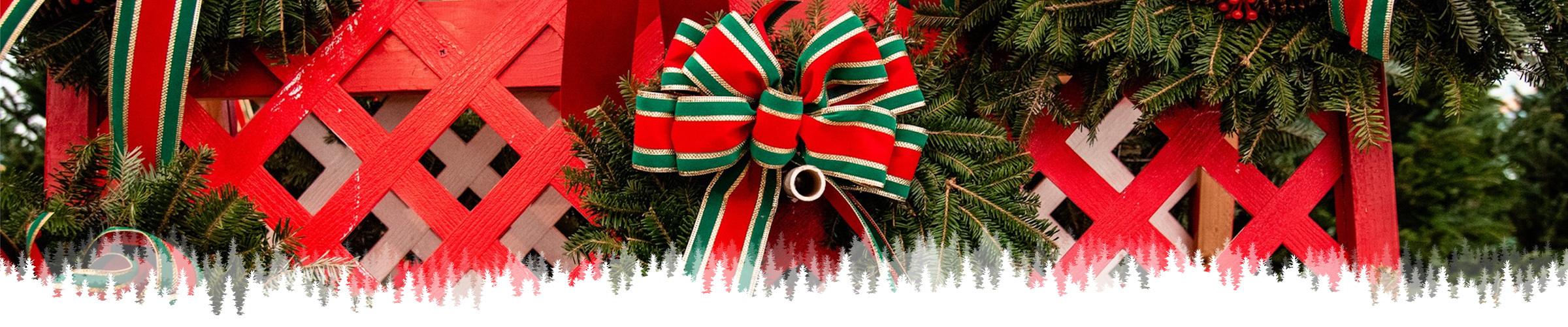 A christmas decour with green and red ribbon
