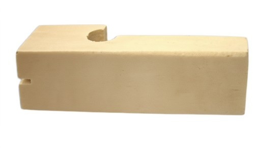 Professional 4-inch hardwood masonry line block for holding mason's line taut on brick and block corners.