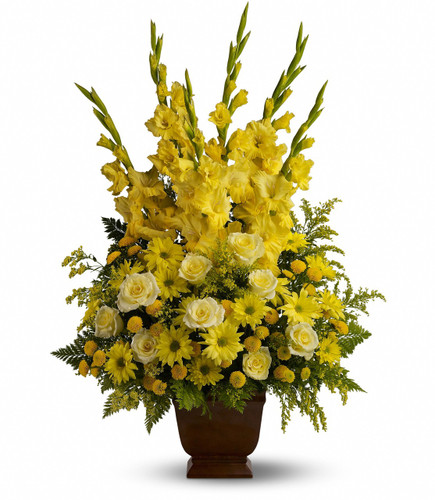 Sunny Memories Yellow Funeral Flowers by Enchanted Florist Pasadena TX. All yellow funeral flower arrangement of bright sunny flowers including yellow gladiolas, yellow roses, yellow daisies and in a brown funeral urn. RM530
